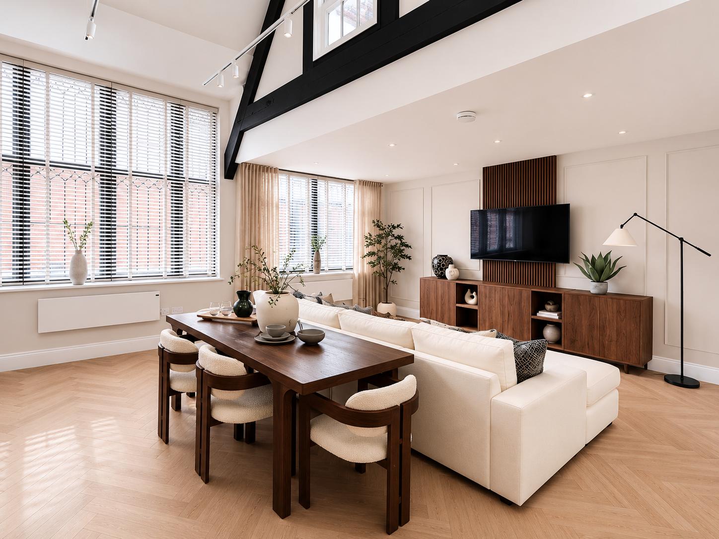 The Olive Press apartment interior with oak beams and olive plants